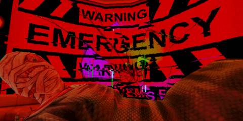 A man with bandages around his head lying in front of a screen displaying an emergency warning