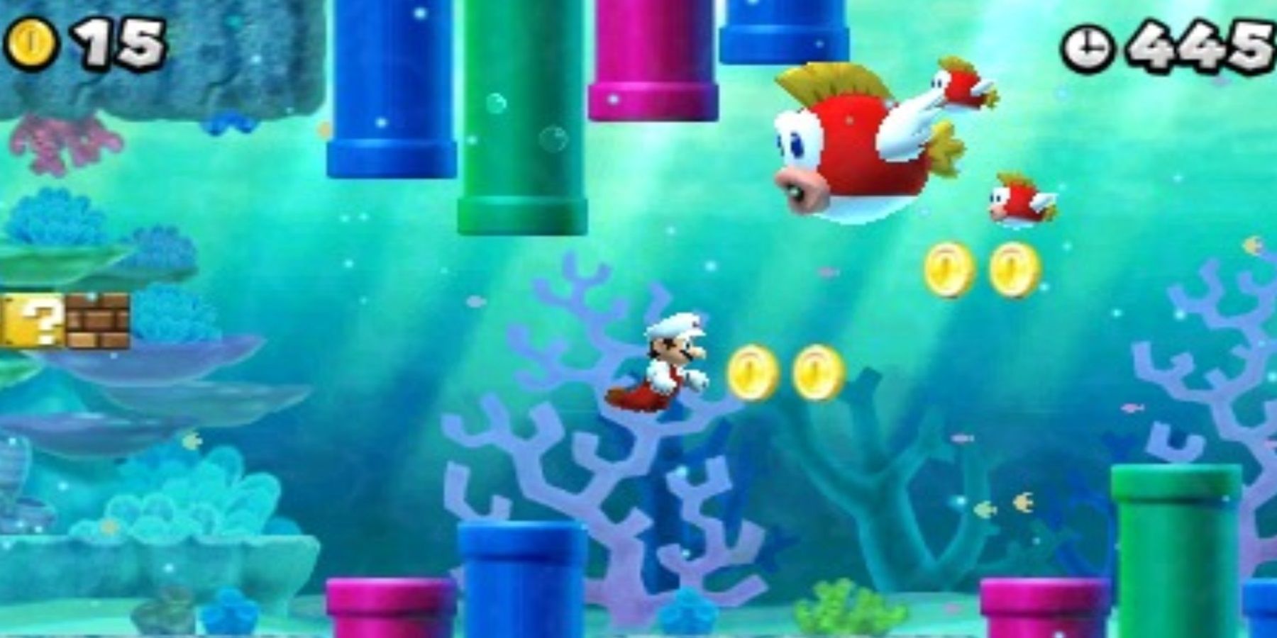 mario swimming through an underwater level