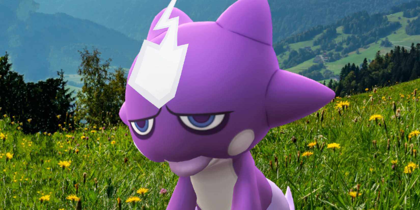 Pokemon GO Toxel: Toxel is sitting patiently on grass in a meadow looking over a valley.