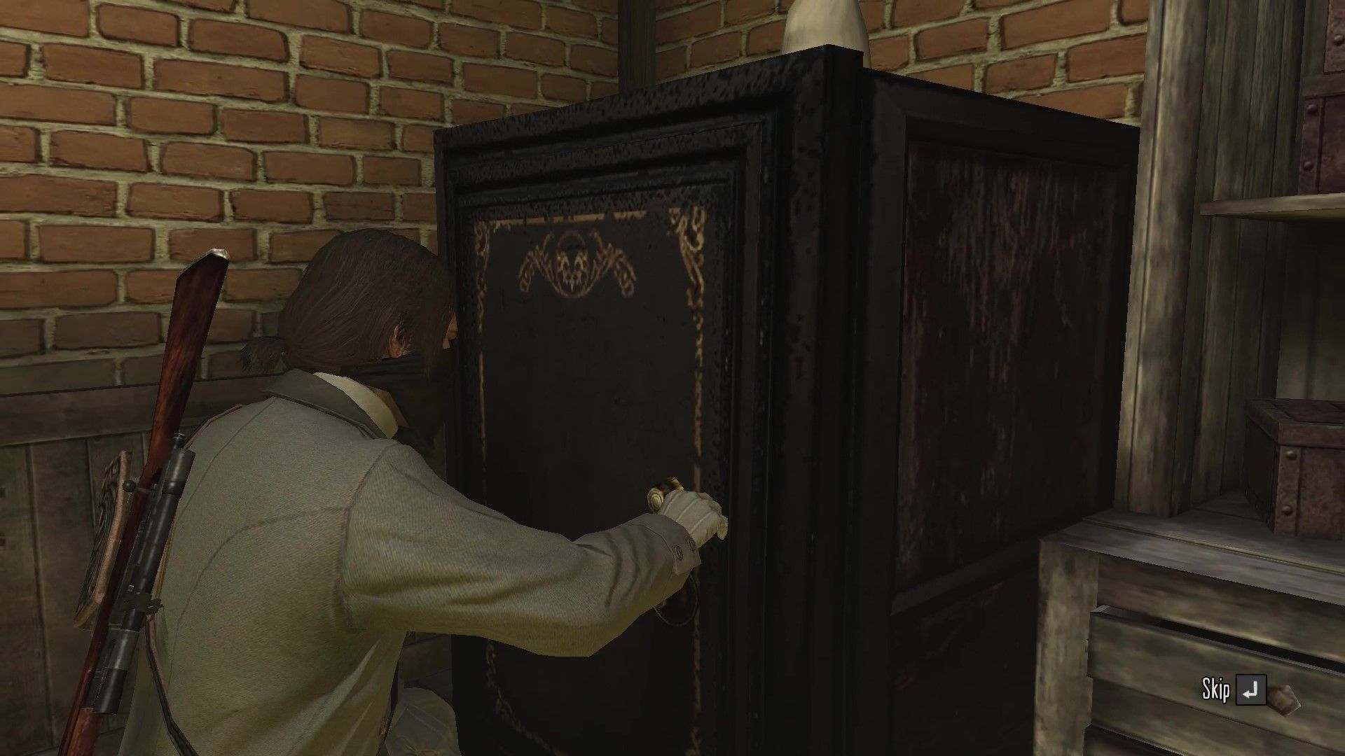 Image showing John Marston cracking safe at the Armadillo bank in Red Dead Redemption.