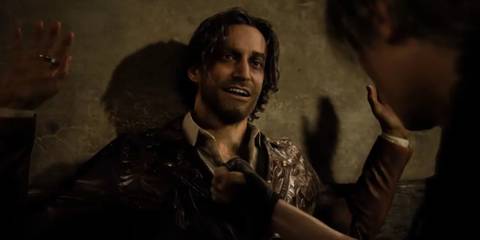 Leon Kennedy pinning Luis Serra against the wall