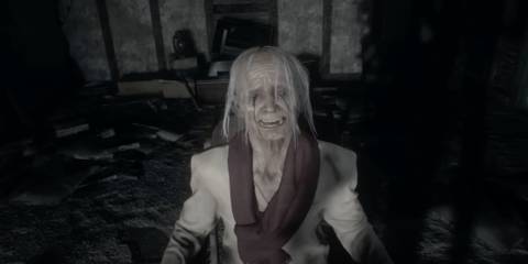 Eveline as the grandmother crying blood in her chair