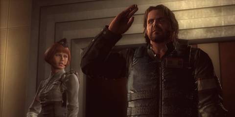 Parker Luciani saluting next to Jessica Sherawat