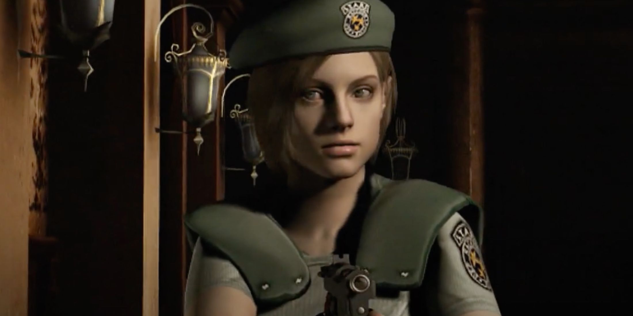 Jill Valentine walking down a corridor in a mansion with her gun drawn