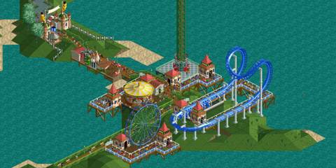 Roller coaster and Ferris wheel on a pier, surrounded by water, in RollerCoaster Tycoon