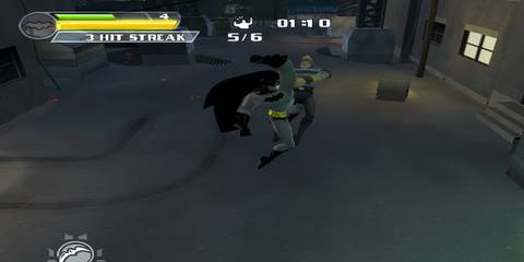batman performing an uppercut on an enemy