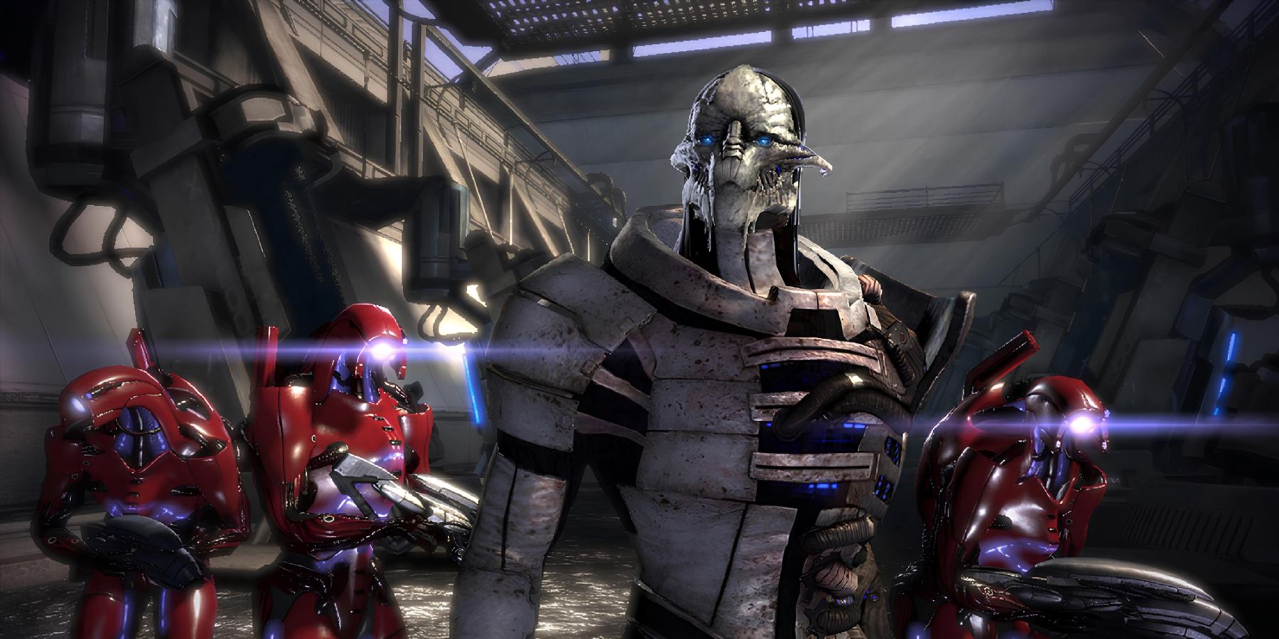 Saren Arterius, who must be in the Mass Effect TV series, flanked by red Geth units