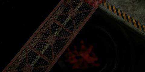 An overview of a metal grate bridge with blood in the water below