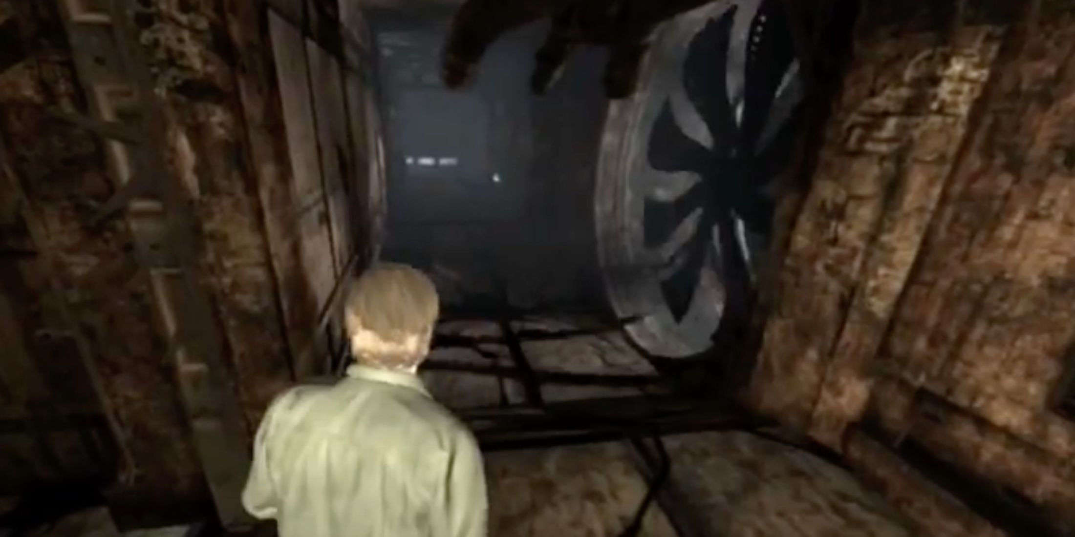 Murphy Pendleton approaching a fan inside an air duct