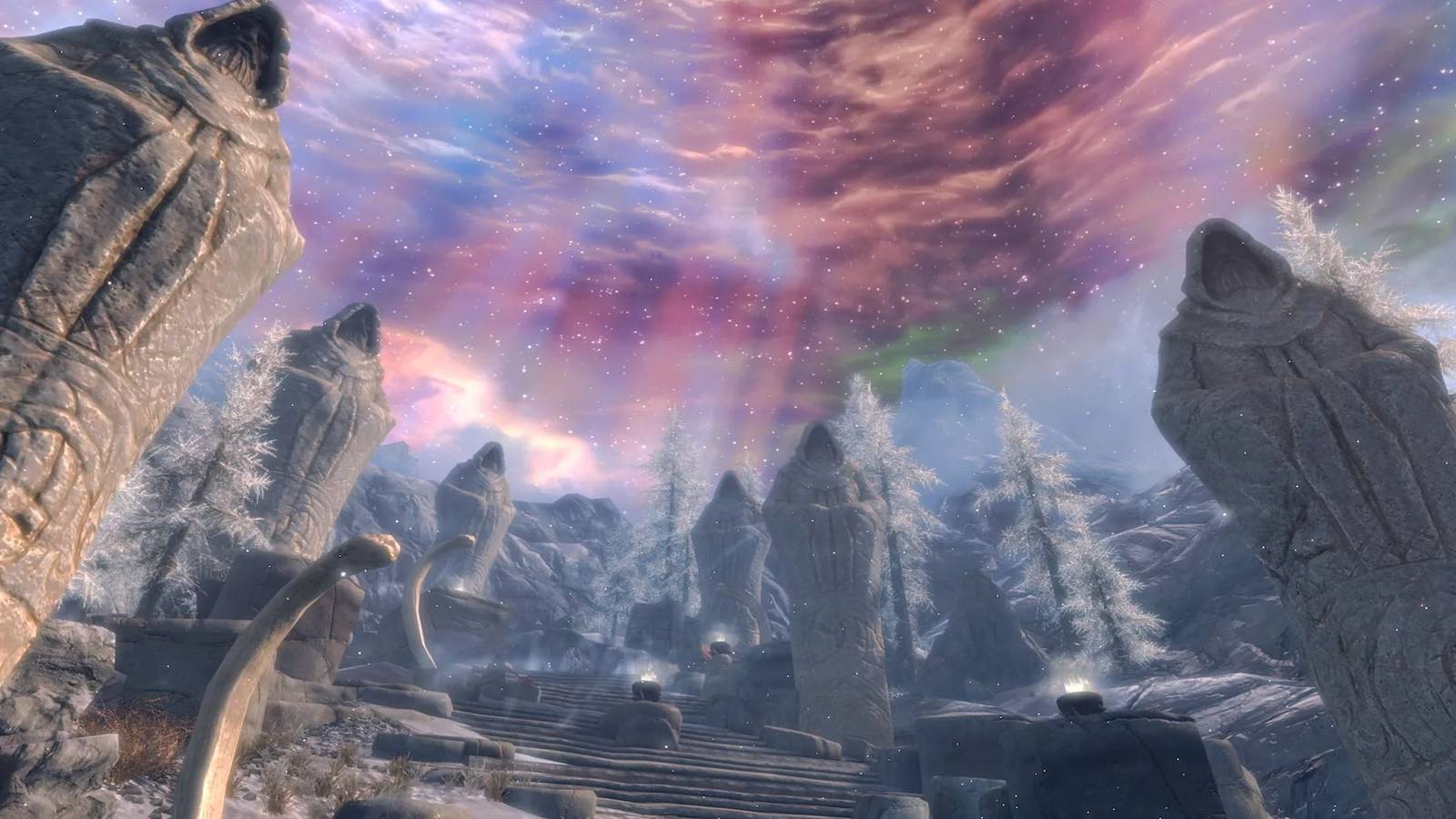 Skyrim statues beneath glowing sky