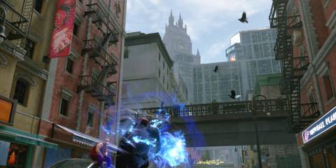 A character charges up energy on a city street in Street Fighter 6