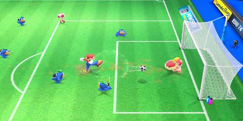 mario kicking a soccer ball