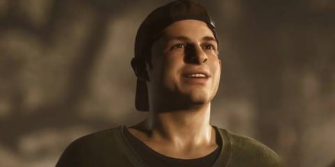 A close-up of Jacob smiling in The Quarry