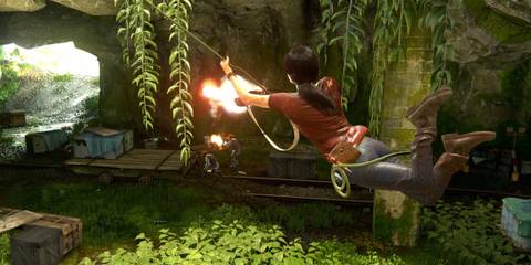 Chloe Frazer hanging and jumping from a tree limb in a jungle landscape