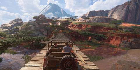 uncharted characters moving through a rugged terrain