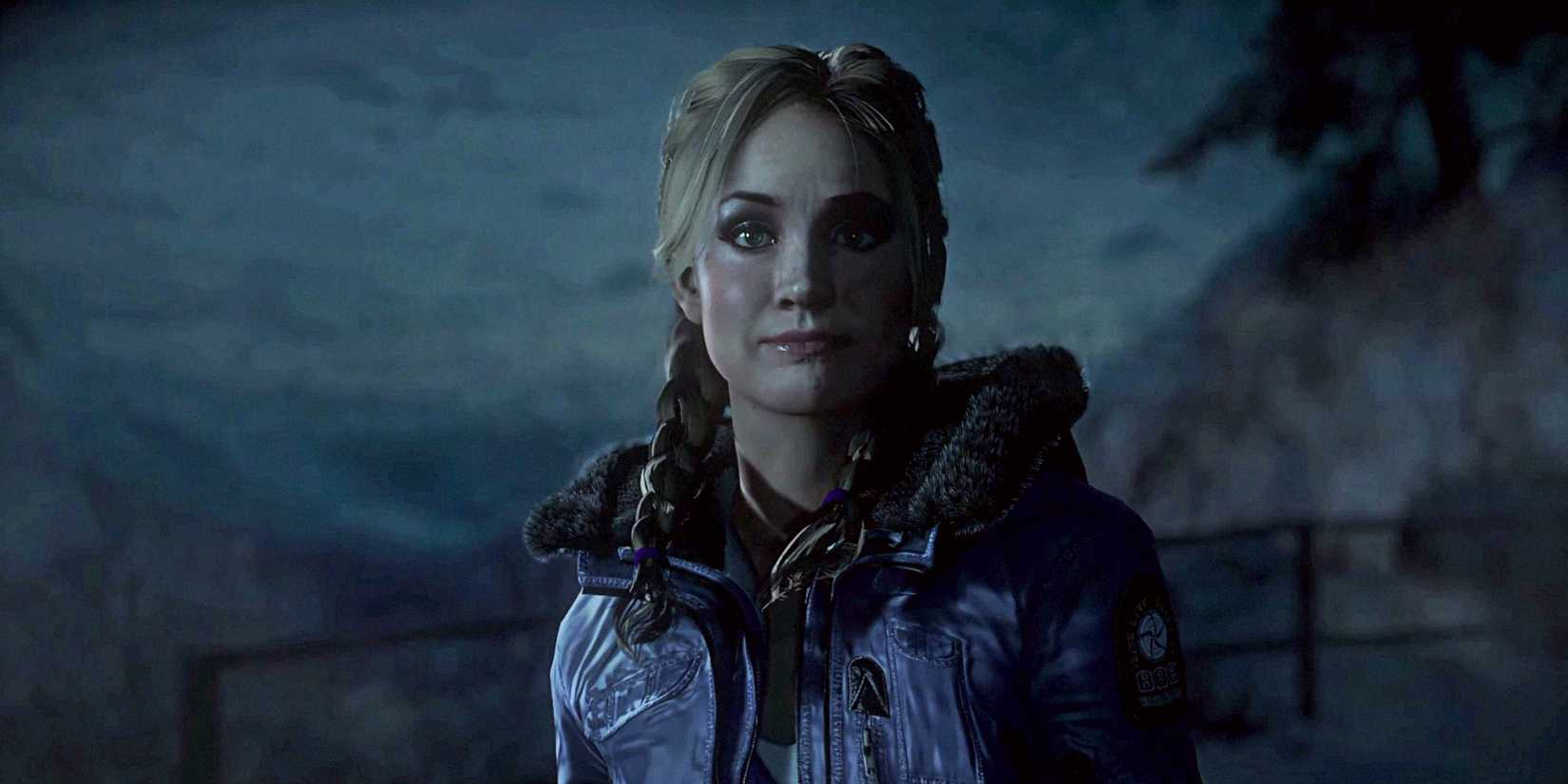 Jessica wearing her winter coat on the mountainside in Until Dawn