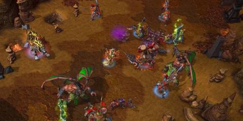 Orc units engaging in combat in Warcraft III: Reforged