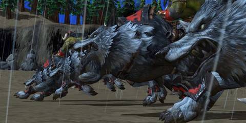 Orc warriors charging on dire wolves in Warcraft III: Reforged