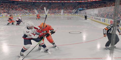 anaheim and washington players battling for a puck