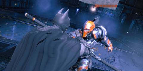 Batman fighting Deathstroke in Batman: Arkham Origins