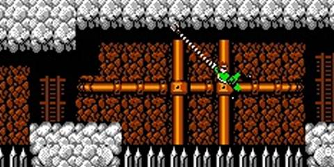 Bionic Commando Nathan Spencer Swinging Over Spikes