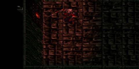 kain in a red tinted room