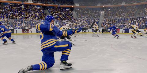 a player taking a slapshot