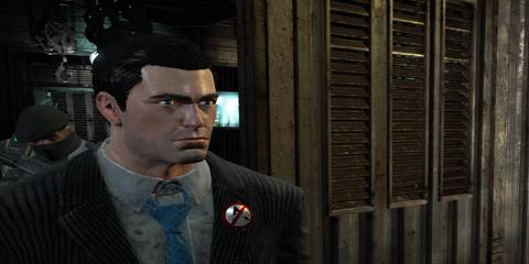 bruce wayne in front of a prison