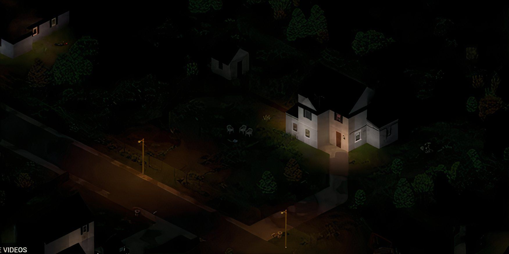 nighttime streetlamp house town