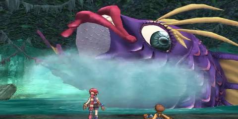 max and monica in front of a giant fish