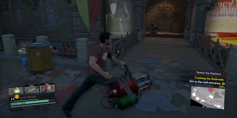 Frank wielding an ornament gun in Dead Rising 4