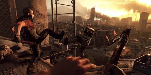 a man kicking a zombie off a rooftop