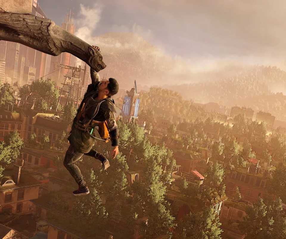 The main character of Dying Light hanging from a ledge