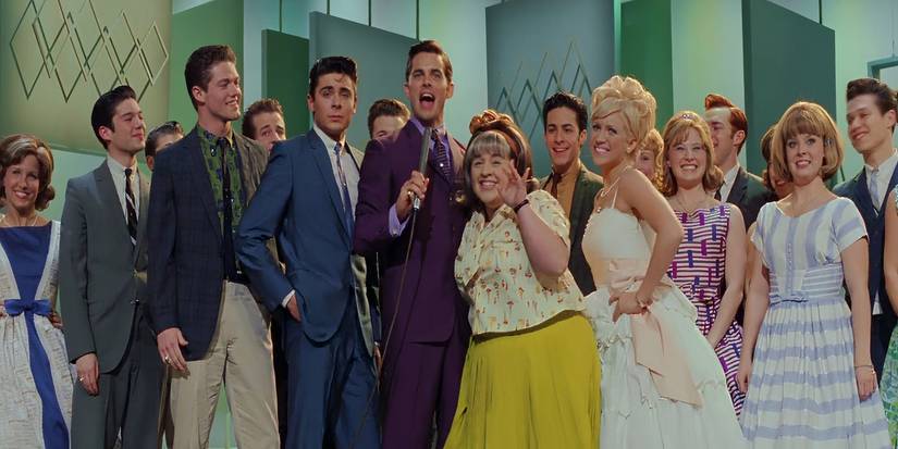 James Marsden and Zac Efron wearing suits in Hairspray
