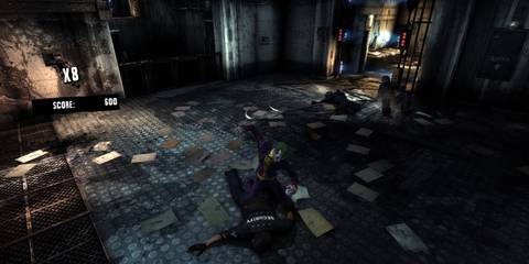 joker fights arkham guards