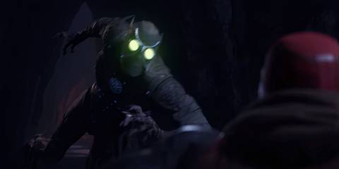 a talon attacking red hood