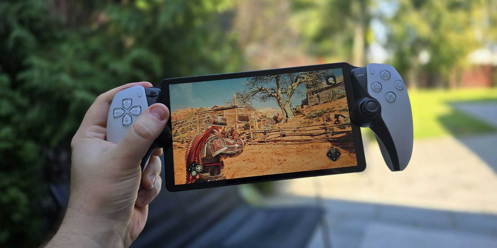 Someone holding a PS Portal running Evil West game