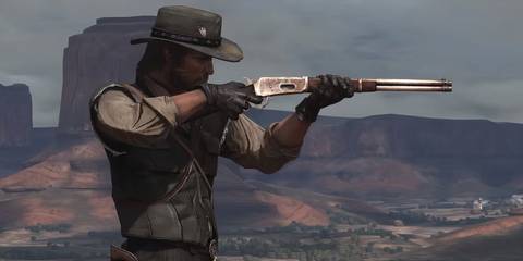 john pointing a rifle