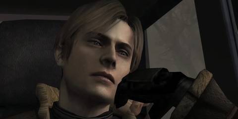 Leon relaxing in a car looking out the window 