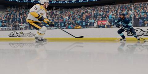 matty beniers skating with the puck