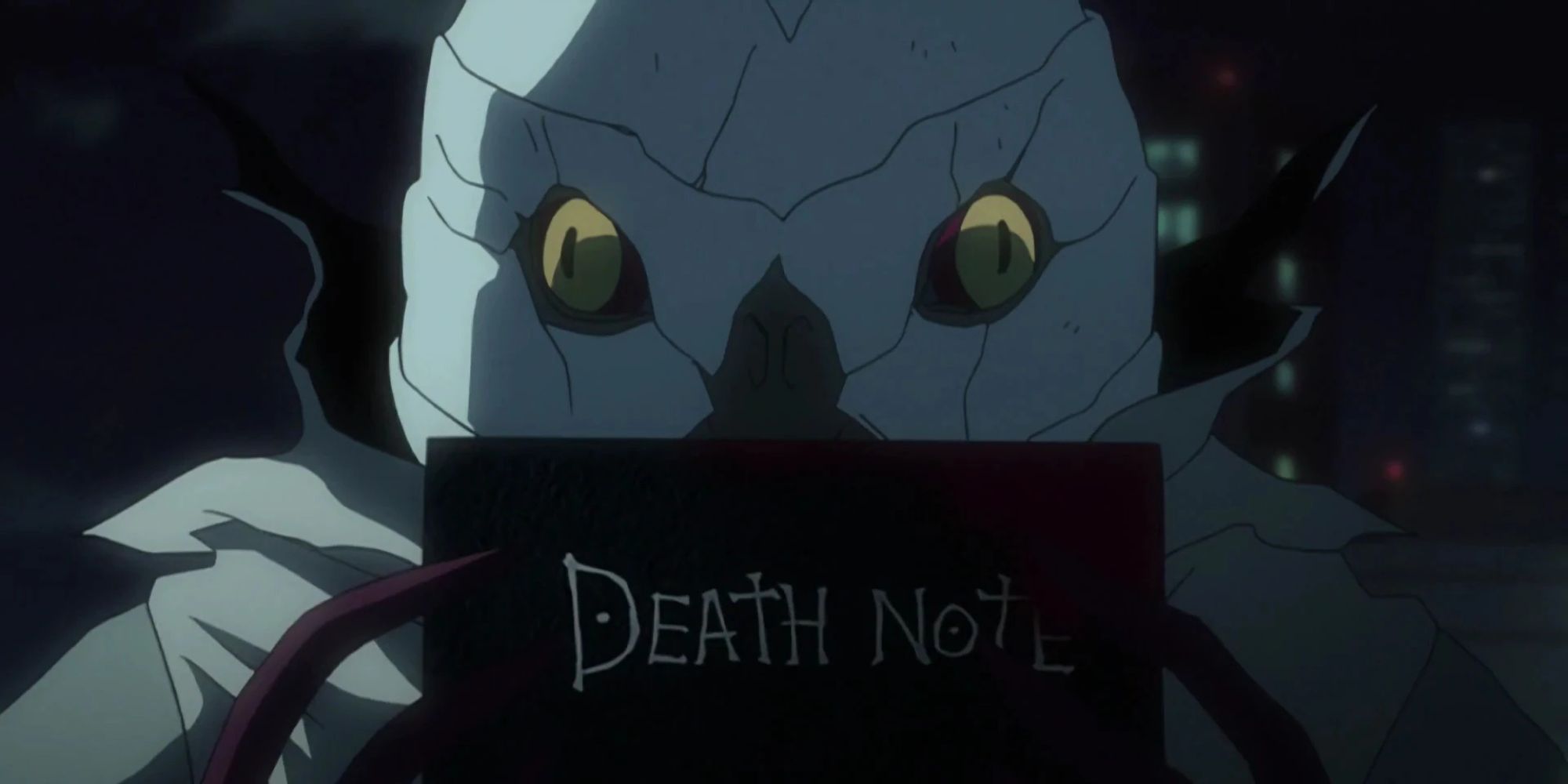 Sidoh holding his own Death Note.