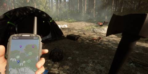 the player holding a GPS device and a Modern Axe