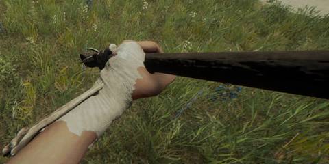 The player holding an Upgraded Spear