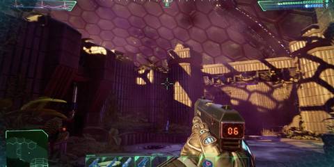 System Shock Remake player holding a gun surrounded by walls