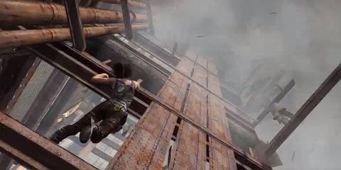 lara climbing up a ship