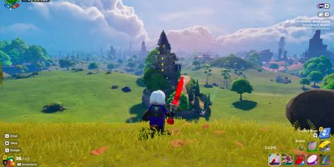 Character standing in a field in Lego Fortnite.