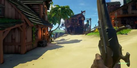 Holding a Pistol in an Island Town on Sea of Thieves
