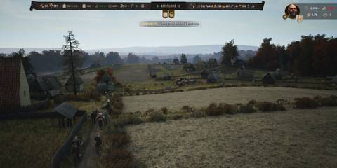 A Developed Town With Townspeople From Manor Lords