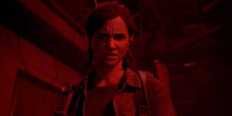 Ellie in a red room in The Last Of Us Part 2