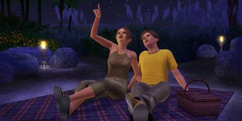 A couple stargazes on a picnic night from The Sims 3 Generations expansion